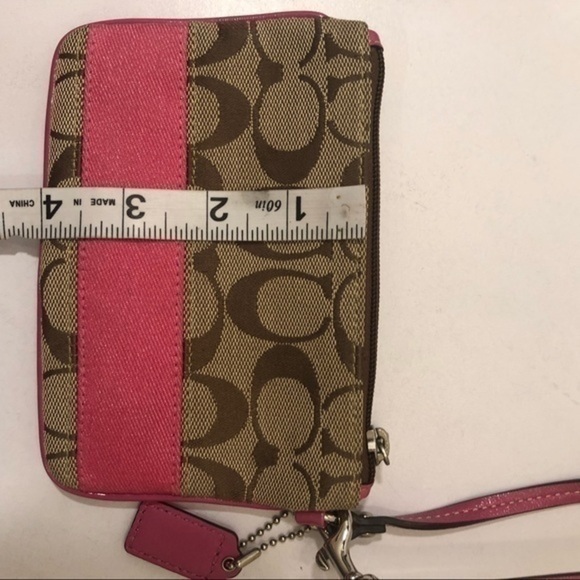 Coach brown pink striped wristlet bag